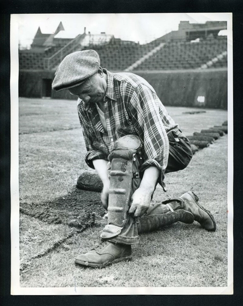Groundskeeper Bud Carlson Dons GABBY HARTNETT's Shin Guards Original News Photo